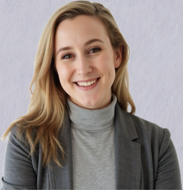 An headshot photo of a white woman with long straight blond hair smiling